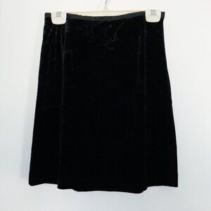 black velvet knee length skirt with floral pattern size S